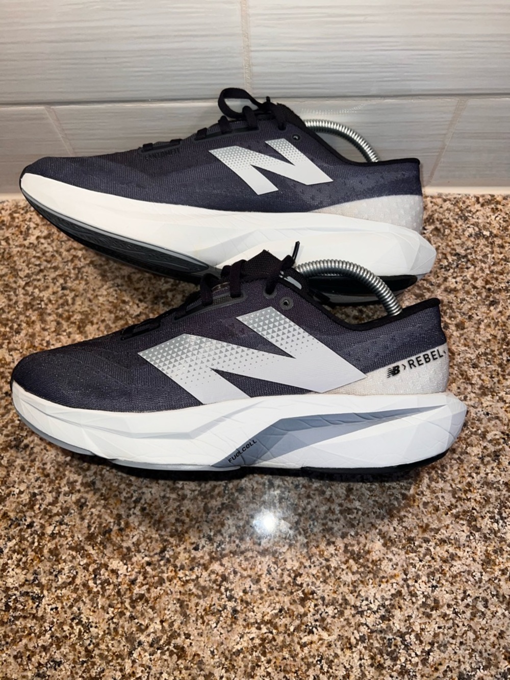 New Balance Men’s Black and White FuelCell Rebel Athletic Shoes